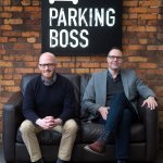 Nathan LeMesurier, left, and Joel DuChesne are partners in Parking Boss, an Everett software firm that helpsapartment and condominium owners keep track of parking. (Andy Bronson / The Herald)