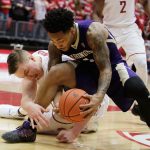 Young Kwak / Associated Press                                Washington State forward Josh Hawkinson (left) and Washington guard David Crisp battle for control of the the ball during the first half of their Pac-12 men&rsquo;s basketball game Sunday in Pullman.