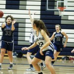 Glacier Peak&rsquo;s Kayla Watkins (left) passes the ball during a Friday practice session. (Ian Terry / The Herald)