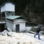 Keith Binkley, the Snohomish County PUD&rsquo;s Natural Resources Manager, walks a path leading to a diversion dam on the Sultan River on Feb. 3. The dam&rsquo;s water channel was recently reconstructed to allow for 6 more miles of access to fish habitat upstream. (Ian Terry / The Herald)