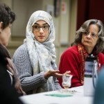 Ressel Al-Maamar, of Everett, shares her experience of being a Muslim woman with other local women at a meeting at Pineview Community Center in Everett on Thursday. After President Trump signed an executive order banning people from seven majority-Muslim nations from entering the U.S., a group of friends decided to host the informal meeting as a way of discussing concerns about the ban as well as providing support to each other. (Ian Terry / The Herald)