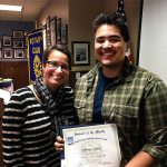 Cassie Franklin, South Everett-Mukilteo Rotary president, congratulates Student of the Month Antonyo Mitchell. (Contributed photo)