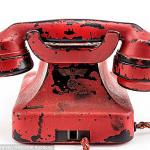 A swastika and Adolf Hitler&rsquo;s name can be seen on the back of the telephone. (Alexander Historical Auctions)