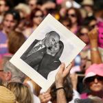 A photo of former President Obama is held up during a Central Florida Women&rsquo;s Rally in Orlando on Jan. 21. (Stephen Dowell/Orlando Sentinel)