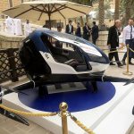A model of EHang 184, the next generation of Dubai Drone Taxi, is displayed during the second day of the World Government Summit in Dubai, United Arab Emirates, on Monday. (AP Photo/Jon Gambrell)
