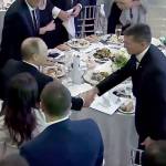 In this image from a video taken on Dec. 10, 2015, and made available on Tuesday, President Donald Trump&rsquo;s former national security advisor, Michael Flynn (right), shakes hands with Russian President Vladimir Putin in Moscow. Flynn, who resigned following reports that he misled White House officials about his contacts with Russia, was attending the 10th anniversary of the Kremlin-controlled television network RT in 2015, where Putin gave a speech. (Ruptly via AP)
