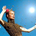 A woman is covered in bees in this still from the documentary &ldquo;Queen of the Sun&rdquo; by Taggart Siegel and Jon Betz. The film, part of the Everett Film Festival, will be shown at 1 p.m. Feb. 18 at the Everett Performing Arts Center. (Submitted photo)