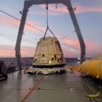 The SpaceX Dragon capsule sits aboard a ship in the Pacific Ocean after returning from the International Space Station in 2015. (AP Photo/SpaceX, File)