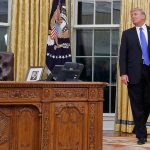 President Donald Trump pauses during a ceremony in Oval Office of the White House in Washington, Wednesday, Feb. 1, 2017, for the swearing in ceremony of Rex Tillerson as Secretary of State. (AP Photo/Carolyn Kaster)