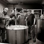 Scrappy Punk Brewing&rsquo;s Greg Krsak, SnoTown Brewing&rsquo;s Frank Sandoval, and Haywire Brewing&rsquo;s David Gez and Bryant Castle toast after brewing the Par-3 Pale Ale that will be the base for a beer they&rsquo;ll unveil Feb. 25 during Washington Beer Open House. (Submitted photo)