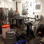 Greg Krsak, owner and head brewer of Scrappy Punk Brewing, works in the brewhouse portion of the brewery in Snohomish.