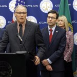 In this Jan. 16 photo, Washington Gov. Jay Inslee speaks during a news conference at the Capitol in Olympia to announce that he and Attorney General Bob Ferguson (third from left) have proposed legislation to abolish the death penalty in Washington state. Despite the backing from Inslee and Ferguson, it appears the measure still won&rsquo;t see a vote in either chamber of the Legislature, leaving it to suffer the same fate as repeal bills introduced in previous years. (AP Photo/Ted S. Warren)