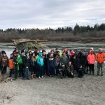 Post Middle School science, technology, engineering and math students were led by Arlington Natural Resource Manager Bill Blake on a field trip behind and below the school to learn about erosion, weatherization, geology and stormwater management. The floodplain tour ended near a glacial erratic. (Contributed photo)