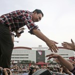 In this Feb. 11 photo, incumbent Jakarta Governor Basuki Tjahaja Purnama greets supporters during a campaign rally in Jakarta, Indonesia. Purnama, popularly known as &ldquo;Ahok,&rdquo; the first ethnic Chinese governor of Jakarta and the first Christian in more than half a century, had seemed unassailably popular until the accusation of blasphemy, a criminal offense in Indonesia, surfaced in September. (AP Photo/Dita Alangkara)
