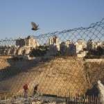 Palestinian laborers work at a construction site in a new housing project in the Israeli settlement of Maale Adumim, near Jerusalem, on Tuesday, Feb. 7. (AP Photo/Oded Balilty)