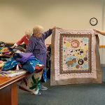 Wrap Them In Love, a local quilting group, donates quilts to a variety of local causes. (Contributed photo)