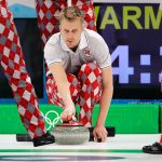 Haavard Vad Petersson of the Norwegian curling team gets set to deliver the stone during practice at the Vancouver 2010 Olympics in Vancouver, British Columbia. (AP Photo/Robert F. Bukaty)