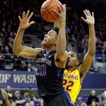Washington&rsquo;s Markelle Fultz (20) drives to the basket ahead of USC&rsquo;s De&rsquo;Anthony Melton during a game Wednesday in Seattle. (AP Photo/Elaine Thompson)