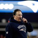 Patriots head coach Bill Belichick talks on his headset on the sideline during the second half of the AFC championship game against the Steelers on Jan. 22 in Foxborough, Mass. (AP Photo/Matt Slocum)