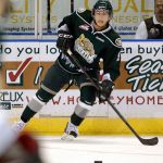 Former Silvertip Tyler Maxwell passes off to a teammate during a game in 2011. Maxwell returned to Everett this past Saturday to take part in Silvertips Alumni Night. (Jennifer Buchanan / The Herald)