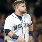 Mariners first baseman Dan Vogelbach lets out a breath after striking out during a game against the Astros on Sept. 16, 2016, in Seattle. (AP Photo/Elaine Thompson)