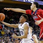 Washington&rsquo;s Markelle Fultz (20) drives for a layup as Arizona&rsquo;s Chance Comanche defends duirng the second half of a game Feb. 18, 2017, in Seattle. Arizona won 76-68. (AP Photo/Elaine Thompson)
