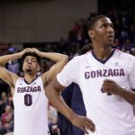 Gonzaga&rsquo;s Silas Melson (0) and Jordan Mathews (4) stand on the court in disbelief after Gonzaga&rsquo;s 79-71 loss to BYU in a game Feb. 25, 2017, in Spokane. BYU won 79-71. (AP Photo/Young Kwak)