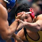 Southridge&rsquo;s Zayid Al-Ghani (left) wrestles Marysville Pilchuck&rsquo;s Keith Pablo in the 170-pound final Feb. 11 at the 3A Region 3 Tournament at Everett High School. (Kevin Clark / The Herald)