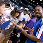 Anthony &ldquo;Buckets&rdquo; Blakes, a 15-year veteran of the Harlem Globetrotters, signs autographs. The Globetrotters perform Feb. 19 in Everett.