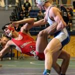 Zach Borisch of Kamiakin wrestles Meadowdale&rsquo;s Liam Ball on the second day of the 3A regional wrestling tournament Saturday afternoon at Everett High School. (Kevin Clark / The Herald)