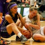 Edmonds-Woodway&rsquo;s Kendra Cooper (left) and Marysville Getchell&rsquo;s Gabrielle Grandbois wrestle for control of a loose ball during a game Feb. 8, 2017, at Marysville Getchell. Edmonds-Woodway won 53-48. (Kevin Clark / The Herald)
