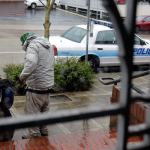 A patron collects himself after being asked to leave for sleeping in the Everett Public Library on Wednesday afternoon. (Kevin Clark / The Herald)