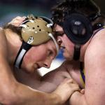 Oak Harbor&rsquo;s Samuel Zook (left) and Arlington&rsquo;s Tristen Emery wrestle in the 285-pound final Saturday night at Mat Classic XXIX in Tacoma. Zook won the match. (Kevin Clark / The Herald)