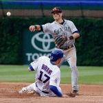 Mariners shortstop Shawn O&rsquo;Malley (right) turns the double play forcing Cubs&rsquo; Kris Bryant (bottom) out at second and getting Anthony Rizzo at first during the seventh inning of a game on Friday, July 29, 2016 in Chicago. (AP Photo/Charles Rex Arbogast)