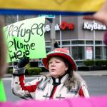 Rev. Rachel Taber-Hamilton leads the rally from Trinity Episcopal Church Sunday afternoon in Everett on February 26, 2017. (Kevin Clark / The Herald)
