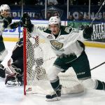 The Silvertips&rsquo; Bradley Goethals (right) celebrates his goal in the second period of a game against the Giants on Saturday night at Xfinity Arena in Everett. (Kevin Clark / The Herald)