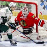 Everett&rsquo;s Devon Skoleski works the puck with Portland&rsquo;s Cole Kehler defending the goal during a game Feb. 24, 2017, at Xfinity Arena in Everett. (Kevin Clark / The Herald)