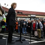 Peggy Nystrom addresses a crowd gathered for the grand opening of Mariner Library in Everett on Saturday. Nystrom had to start two petitions during the process of planning the new library. (Ian Terry / The Herald)
