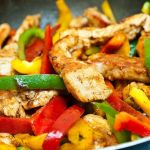 These homemade fajitas are filled with chicken and colorful vegetables. (Thinkstock photo)
