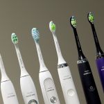 A row of Philips Sonicare toothbrushes and heads in a row at the Philips factory in Bothell. The toothbrushes are designed at the Bothell site. (Andy Bronson / The Herald)