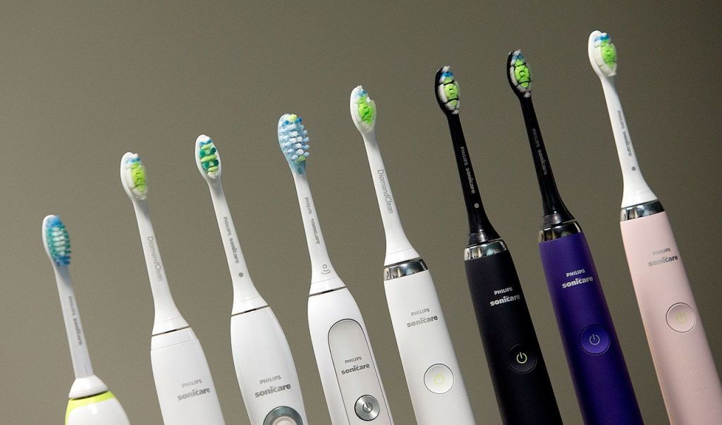 A row of Philips Sonicare toothbrushes and heads in a row at the Philips factory in Bothell. The toothbrushes are designed at the Bothell site. (Andy Bronson / The Herald)