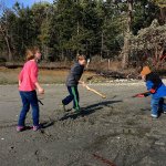 The Swaney kids play on the beach at Kitsap Memorial State Park like it was summer, even though its February. (Aaron Swaney / The Herald)