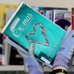 Books are stocked at the new Mariner Library in Everett on Feb. 2. The demonstration community library will carry more than 16,000 titles and will open Saturday. (Kevin Clark / The Herald)