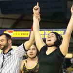 Kamiak&rsquo;s Ally DeLa Cruz celebrates her pin of Sequim&rsquo;s Alma Mendoza in the 155-pound weight class during Mat Classic XXIX on Saturday. (Kevin Clark / The Herald)
