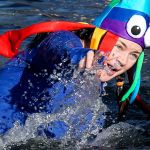 A plunger stumbles in the cold waters. (Kevin Clark / The Herald)