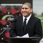 Javier Juarez, 23, speaks during the grand opening for Mariner Library in Everett on Saturday. Juarez used the bookmobile while attending Voyager Middle School because the closest library to his home was almost a two-hour walk away. (Ian Terry / The Herald)