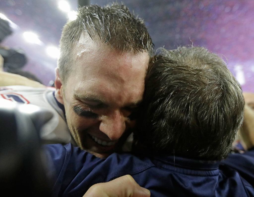 New England Patriots&rsquo; Tom Brady celebrates with head coach Bill Belichick after winning Super Bowl 51. Brady engineered the Patriots comeback victory with touchdown drives in the fourth quarter and a third in overtime to win 34-28. (AP Photo/David J. Phillip)