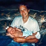 In one of Stephanie Powell Leisure&rsquo;s family photos taken nearly 20 years ago, Gordon &ldquo;Casey&rdquo; Powell holds his newborn niece, MacKenzie. (Photo courtesy Stephanie Powell Leisure)