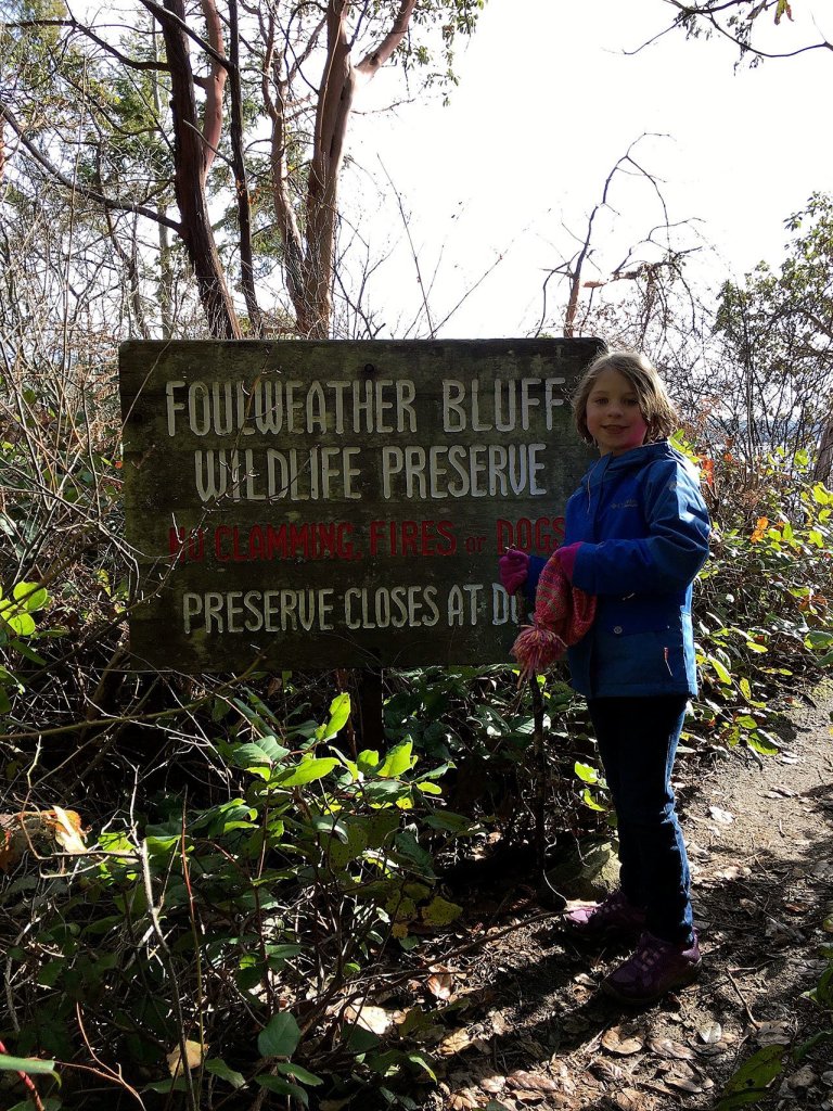Grace Swaney hiked the Foulweather Bluff wildlife preserve with her family during a winter camping trip at Kitsap Memorial State Park. (Aaron Swaney / The Herald)