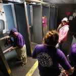 Members of Snohomish County&rsquo;s chapter of The Well Armed Woman pack up after a practice session at the Norpoint Shooting Center in Arlington on Saturday, Feb. 4. (Ian Terry / The Herald)